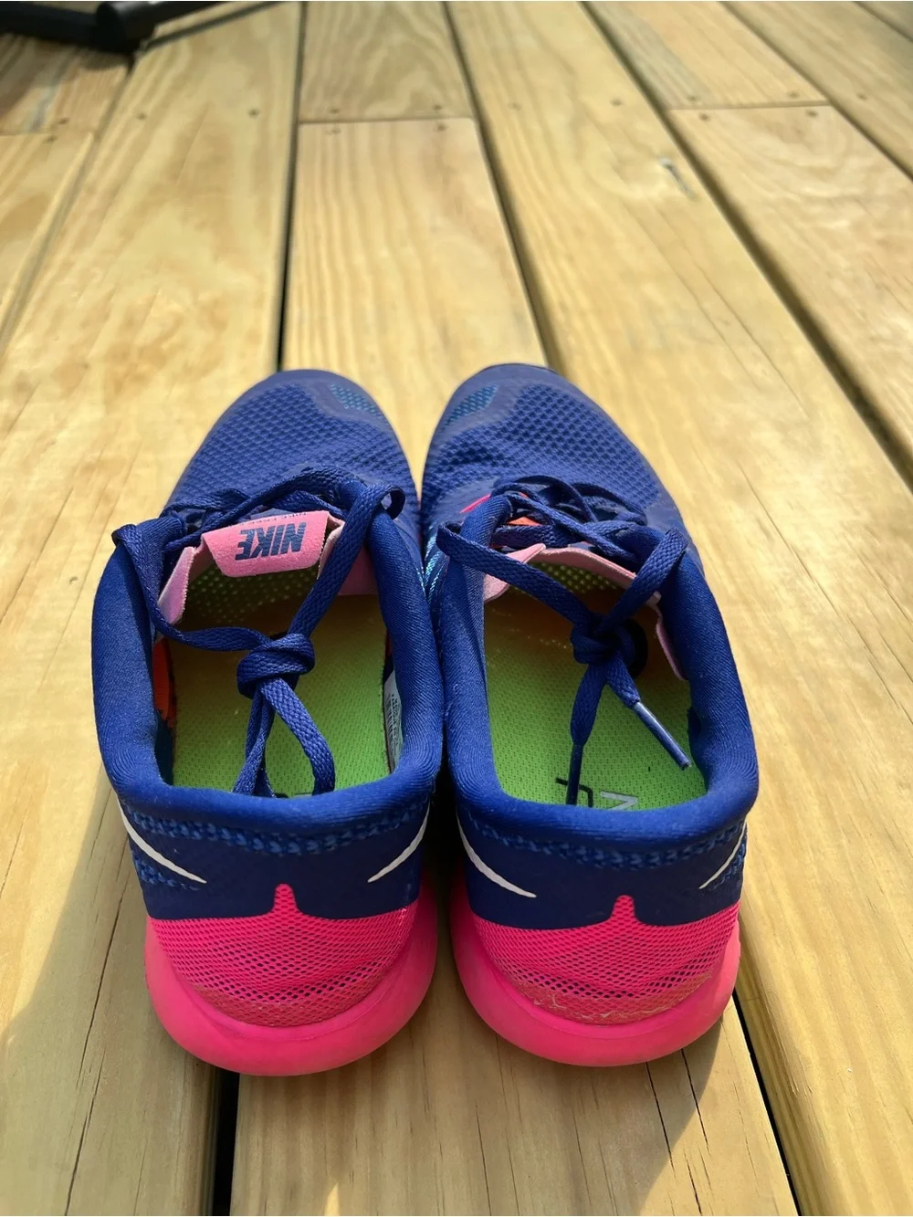 Nike Women’s Navy Blue and Hot Pink Athletic Running Shoes. Nike Free 5.0